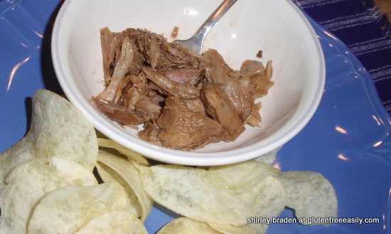 World's Easiest and Best Pulled Pork. Slow cooked and beyond delicious barbecue. You'll want to stand right there and want to eat it right out of the slow cooker! (photo)