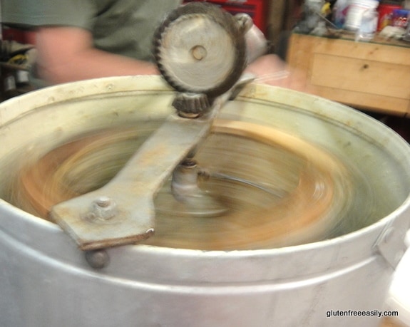 Raising Honey Bees and Harvesting Their Honey. Spinning the honey out of the frames.