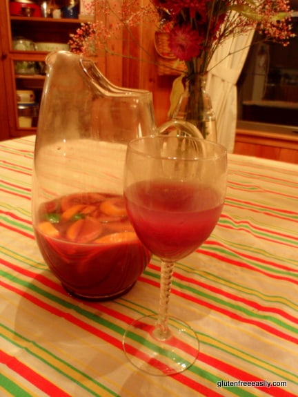 Homemade Sangria is the best! It's an inexpensive way to serve a group at celebrations like Cinco de Mayo, New Year's, summer events, and more. [from GlutenFreeEasily.com] (photo)