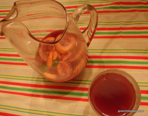 Homemade Sangria is the best! It's an inexpensive way to serve a group at celebrations like Cinco de Mayo, New Year's, summer events, and more. [from GlutenFreeEasily.com] (photo)