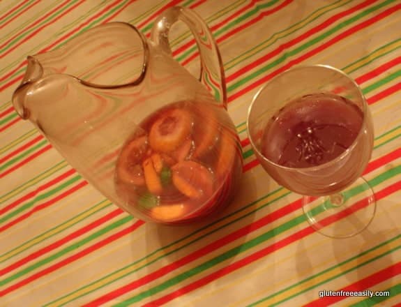 Homemade Sangria is the best! It's an inexpensive way to serve a group at celebrations like Cinco de Mayo, New Year's, summer events, and more. [from GlutenFreeEasily.com] (photo)