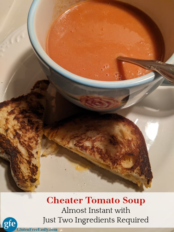 Gluten-Free Cheater Tomato Soup. Almost instant with just two ingredients. In a blue flowered bowl with grilled gluten-free cheese sandwich on white plate.