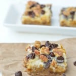 Gluten-Free 7-Layer Bars (Magic Cookie Bars). Pumpkin 7-Layer Bars shown, but also check out Gingerbread, Peppermint, and Valentine's versions also [featured on GlutenFreeEasily.com] (photo)