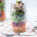 Thai Green Salad with Shrimp and Spicy Almonds in two Mason jars. Gluten free and paleo. Omit the shrimp for a vegetarian and vegan option.