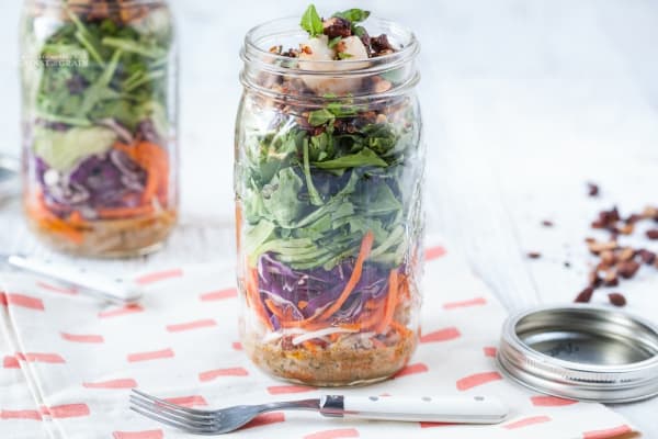 Thai Green Salad with Shrimp and Spicy Almonds in two Mason jars. Gluten free and paleo. Omit the shrimp for a vegetarian and vegan option.