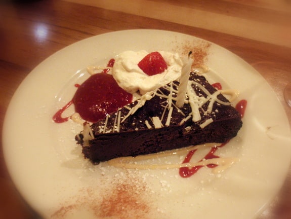 Flourless Chocolate Cake with Homemade Whipped Cream and Raspberry Coulis