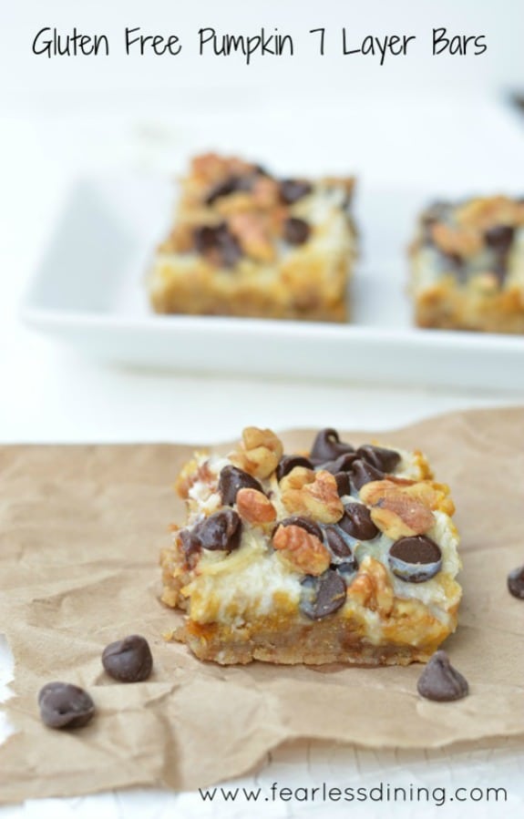 Gluten-Free 7-Layer Bars (Magic Cookie Bars). Gluten-Free Pumpkin 7-Layer Bars shown. [featured on GlutenFreeEasily.com] (photo)