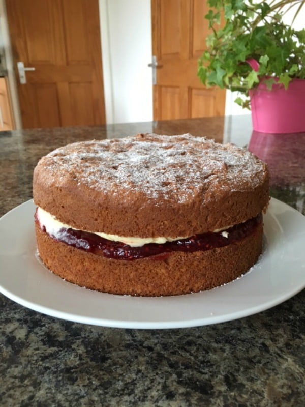 Simple and elegant Victoria Sponge Cake with Jam and Buttercream Filling. [featured on GlutenFreeEasily.com] (photo)Simple and elegant Victoria Sponge Cake with Jam and Buttercream Filling. [featured on GlutenFreeEasily.com] (photo)