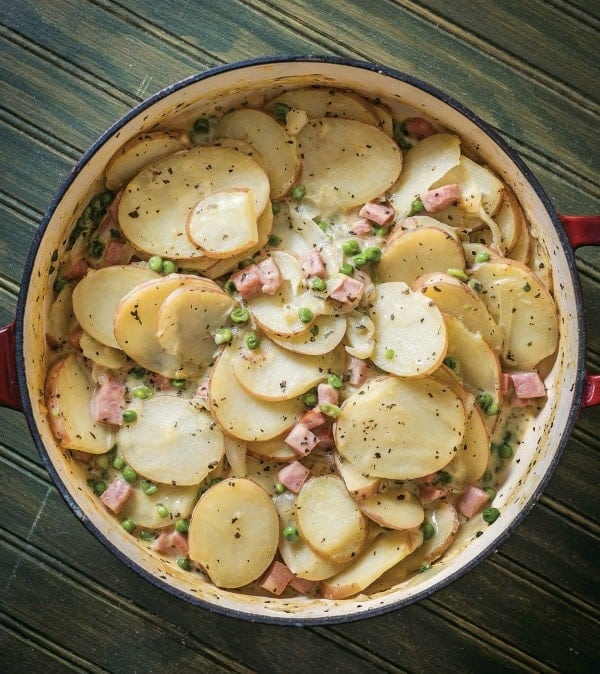 Yes, scalloped potatoes can be a wonderful skillet supper! Skillet Scalloped Potatoes with Ham and Peas from Prep Ahead Meals by Alea Milham.