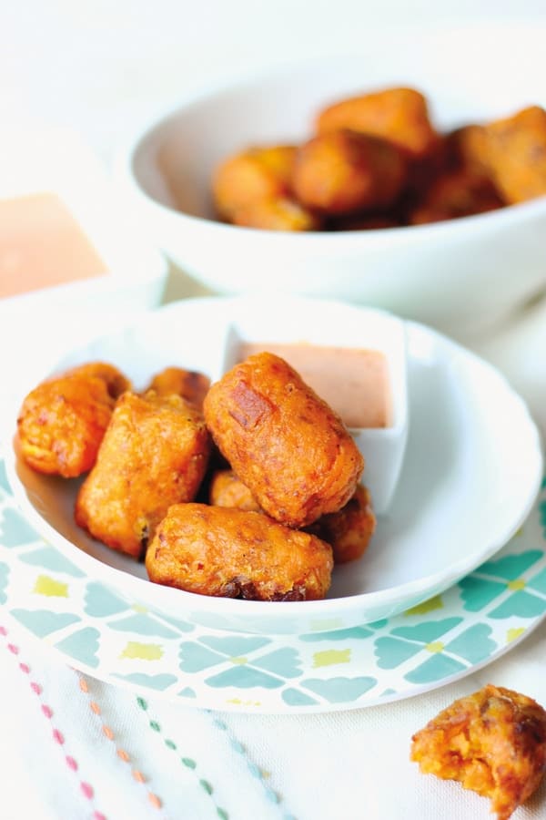 Whether or not you're currently a tater tots fan, you are sure to love these Paleo Sweet Potato Bacon Tater Tots. The combination of flavors and textures are divine! [featured on GlutenFreeEasily.com] (photo)