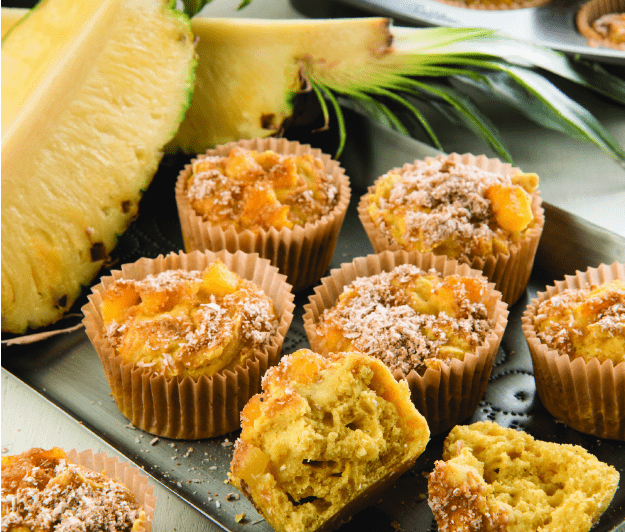 Gluten-Free Tropical Pineapple Ginger Muffins. These pineapple muffins have the power to transport you to a tropical island where coconuts abound and ginger is the spice of life. The streusel helps caramelize the pineapple so that you get all that gooey goodness. One of 20 gluten-free muffin recipes featured on gfe for March Muffin Madness.