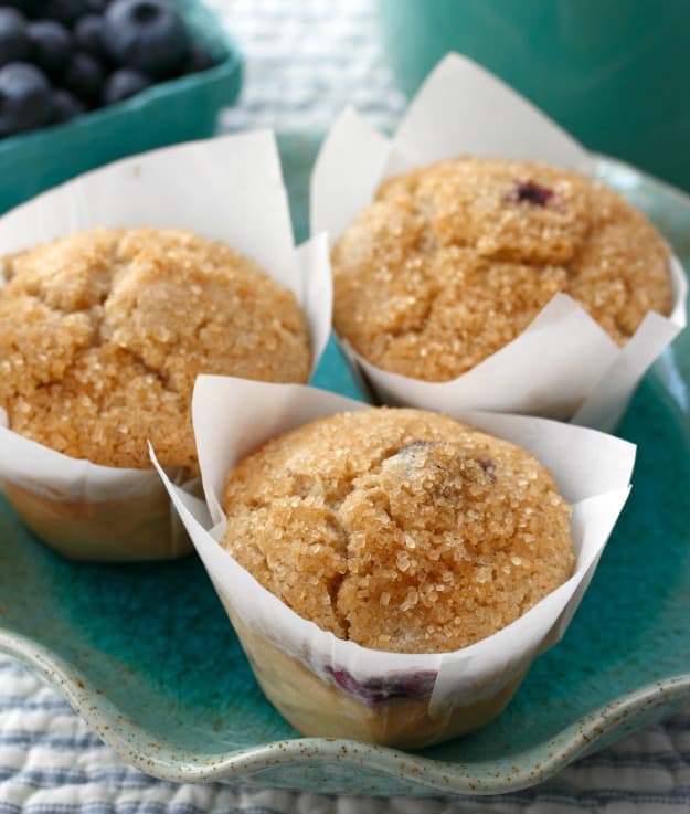 Gluten-Free Blueberry Muffins with Sugar Crunch Topping. These muffins are fabulous when blueberries are in season but also work quite well with frozen blueberries. The raw sugar is what gives these muffins a crunchy top.” One of 20 gluten-free muffin recipes featured on gfe for March Muffin Madness.