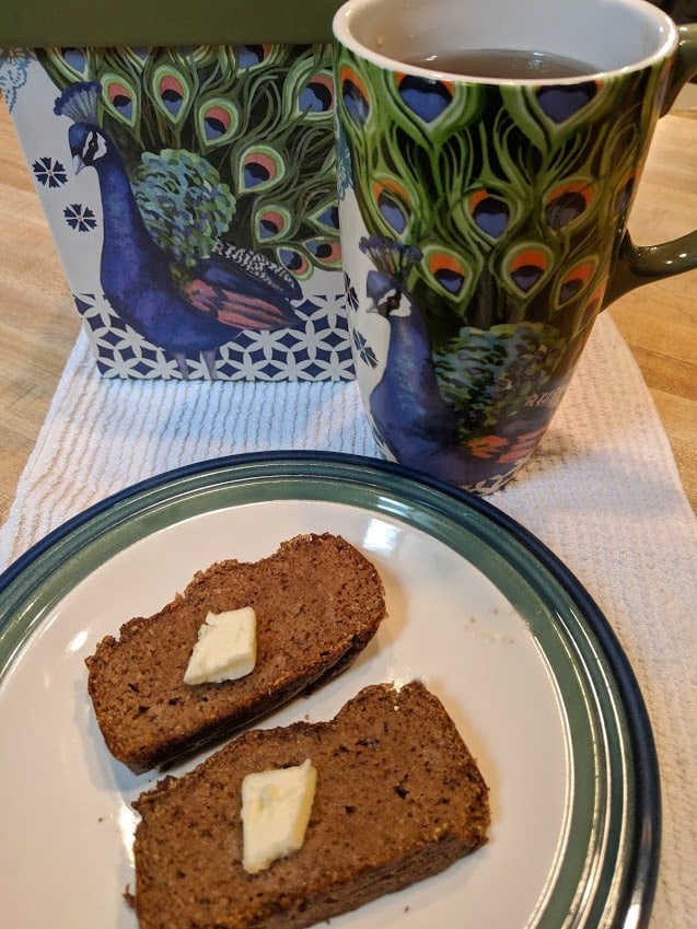 Gluten-Free Keto Pumpkin Bread. Two slices with my new peacock mug, a gift from a dear friend. Recipe from Keto Breads cookbook by Cassidy Stauffer. [featured on GlutenFreeEasily.com]