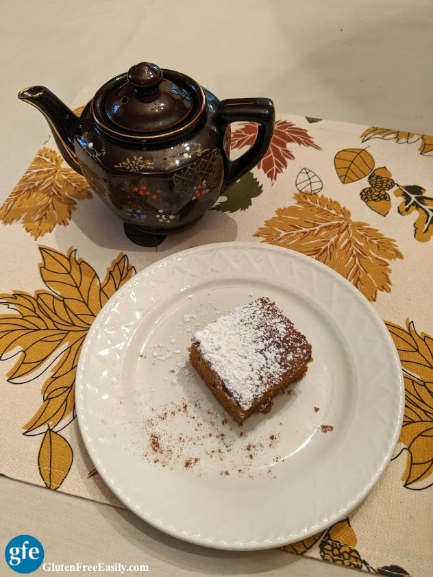 Slice of Pumpkin Spice Cider Cake with Teapot on Gluten Free Easily