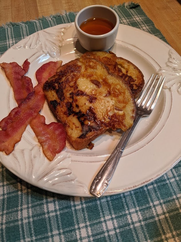 Gluten-Free Honey French Toast with bacon and honey on the side. From Gluten Free Easily.