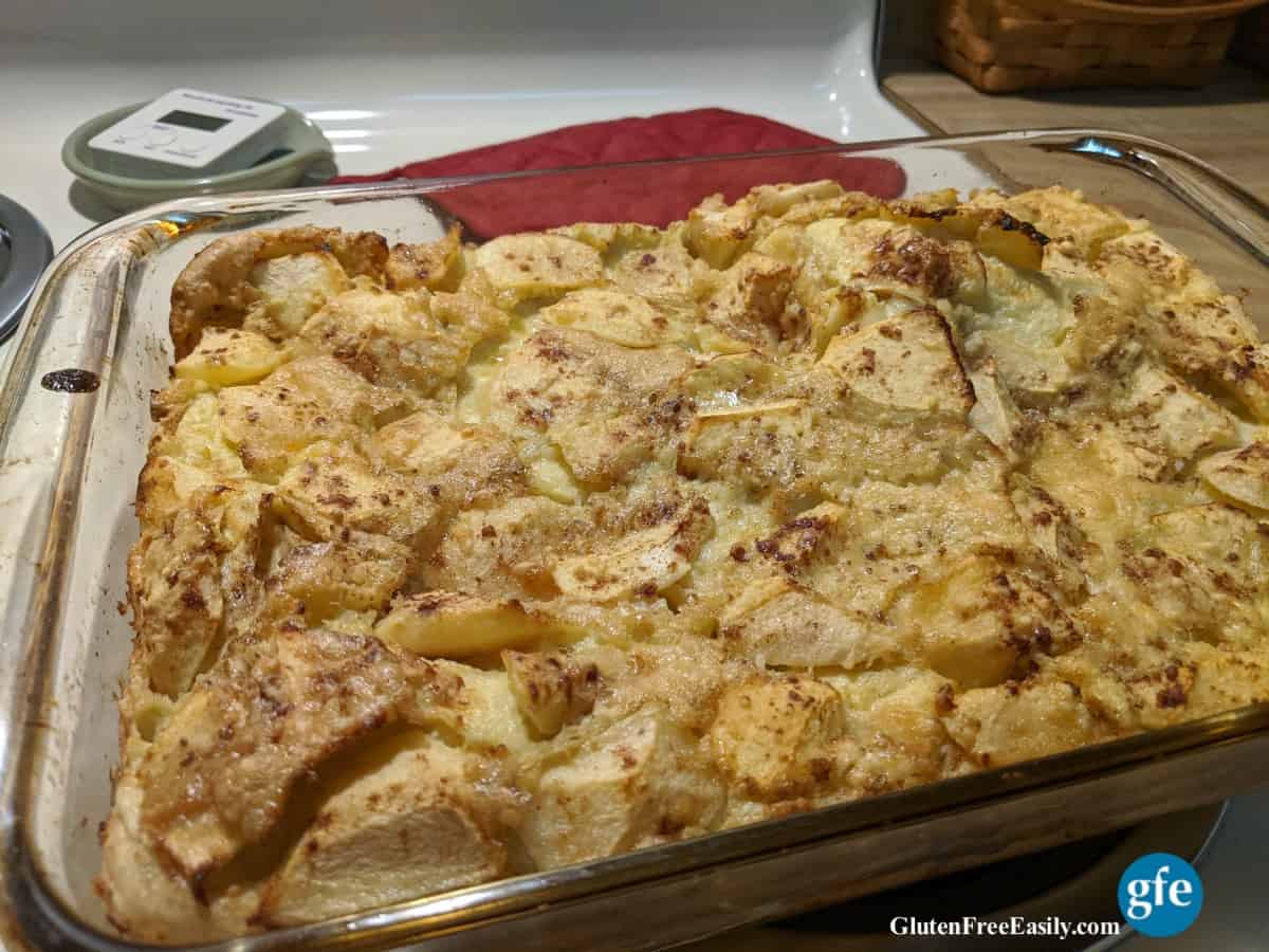 Gluten-Free Apple Cinnamon Volcano Pancake cooling on stove.