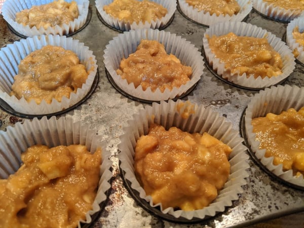 Gluten-free and paleo Apple Crumb Muffins in old Ecco muffin tin before adding crumb topping and baking.