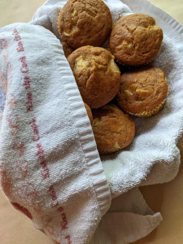 Gluten-Free Double Apple Muffins in Basket on Counter