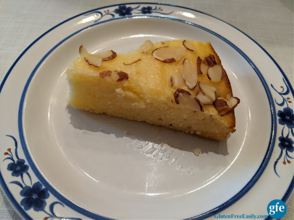 A slice of Gluten-Free Italian Lemon Ricotta Cake. Heaven on a plate!