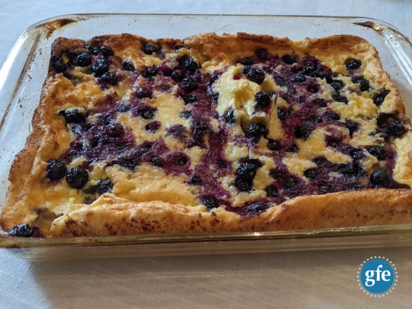 Gluten-Free Blueberry Volcano Pancake shortly after coming out of the oven. So delicious! I love the corner and edge pieces for that little bit of crusty goodness but it's all good! p.s. Some of you may call this a Dutch baby, puff pancake, Yorkshire pudding, or another name.