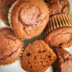 Gluten-Free Old-Fashioned Molasses Muffins with one cut in half.