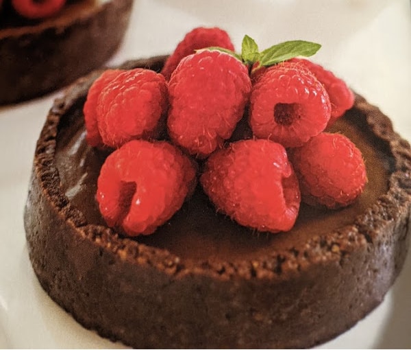 No-Bake Tartlets with Raw Vegan Chocolate Ganache Filling from Choosing Raw cookbook.