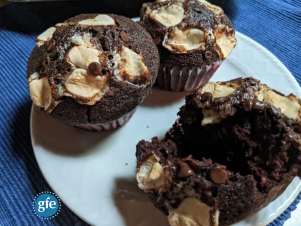 Gluten-Free Gimme S'More Muffins Close-up with one muffin broken open.