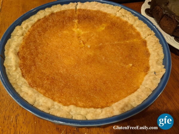 Gluten-Free Lemon Chess Pie partially sliced and ready to eat at the luncheon.