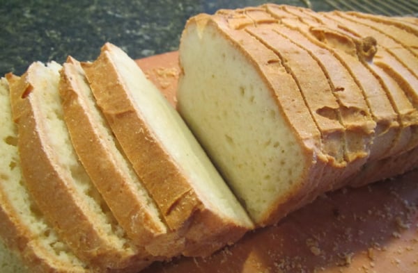 Gluten-Free White Sourdough Bread from Successfully Gluten Free. Cut into slices on cutting board.