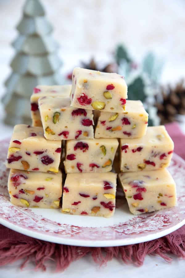 This Creamy Keto White Chocolate Fudge is festively perfect for the holidays. It's one of a collection of the best gluten-free fudge recipes. Recipes worth gifting for the holidays and beyond!